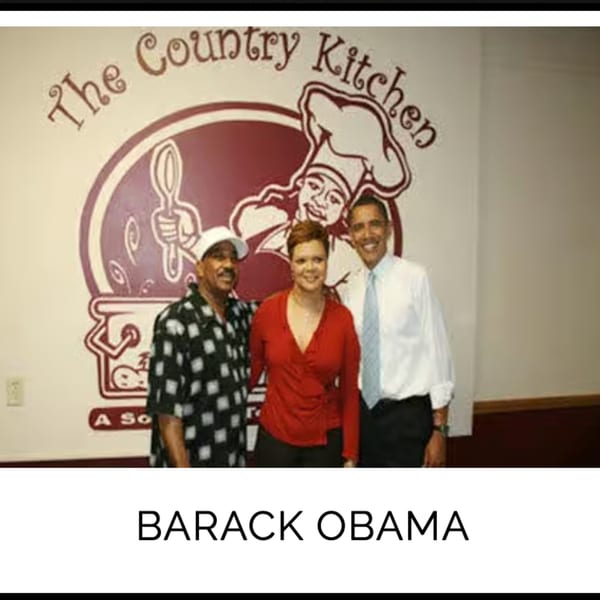 Barack Obama, a woman, and a man smiling in front of the Kountry Kitchen logo.