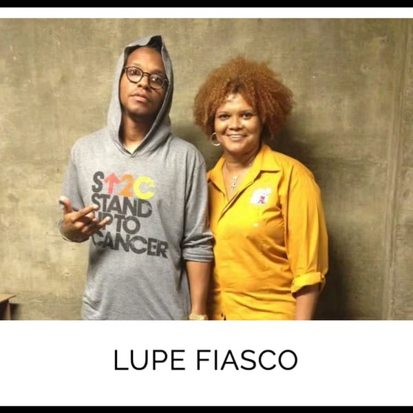 Lupe Fiasco in a grey hoodie next to a woman with curly hair in a yellow shirt.