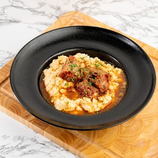 Oxtail and Grits/ Oxtail y Grits